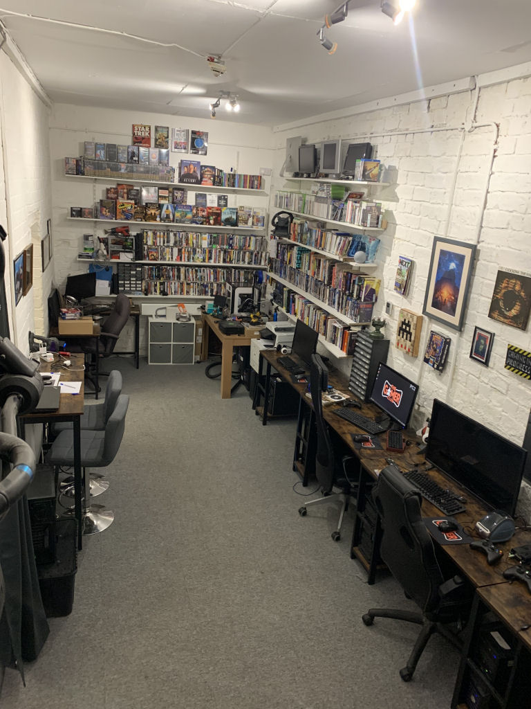 View looking toward the south wall featuring hackerspace and PC game collection